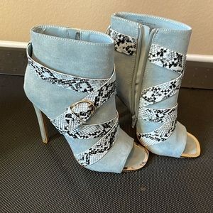 Baby blue open toe booty with snake print belt rounded zipper on the side